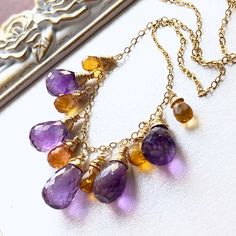 "6970 Amethyst Citrine Necklace Gold Filled wire wrapped natural purple yellow gemstone beaded fringe bohemian statement choker anniversary holiday gift for her women mom sister wife girlfriend niece aunt grandma cousin best friend colleague. Enjoy the beauty & power of natural gemstones! THIS LISTING IS FOR THE NECKLACE ONLY Earrings shown for illustration and listed separately; MATERIALS & DIMENSIONS ✦ Natural AMETHYST, vivid purple, faceted teardrops approx. 13x8|11x7mm; ✦ Natural CITRINE, ye Purple Bohemian Necklaces For Healing, Bohemian Purple Necklaces For Healing, Purple Bohemian Healing Necklaces, Bohemian Purple Necklace For Healing, Bohemian Amethyst Gemstone Beads Crystal Necklaces, Bohemian Amethyst Gemstone Bead Crystal Necklace, Bohemian Amethyst Gemstone Beaded Crystal Necklace, Bohemian Amethyst Necklaces For Jewelry Making, Bohemian Amethyst Pendant Jewelry