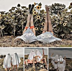 two women dressed in white are sitting on the ground with sunflowers