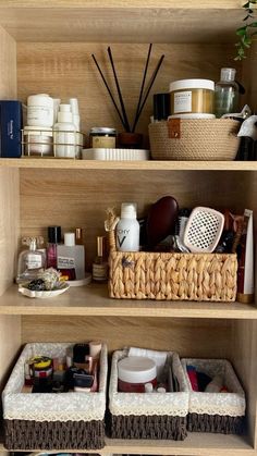 the shelves have baskets and other items in them on them, including toothbrushes