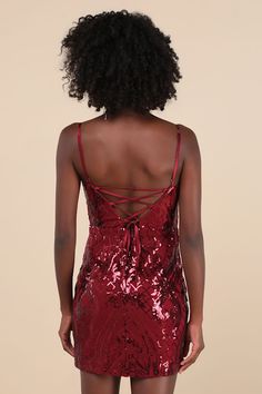 Enchant everyone you meet with your irresistible look in the Lulus Sparkling Magic Wine Red Sequin Lace-Up Mini Dress! This show-stopping dress features a mesh knit composition, adorned with a glowing sequin pattern throughout, that shapes a straight neckline and a darted bodice, all supported by adjustable spaghetti straps. High, fitted waist tops a figure-flaunting bodycon skirt that ends at a sexy mini hem. A set of satin straps lace-up and tie across the open back. Hidden back zipper/clasp. Bodycon Mesh Party Dress With Spaghetti Straps, Red Sequin Dress For Night Out, Sleeveless Sequin Dress For Red Carpet And Holidays, Red Sequined Bodycon Dress For Evening, Glamorous Red Sequin Dress For Date Night, Elegant Red Sequin Dress For Date Night, Fitted Spaghetti Strap Dress For Red Carpet, Glamorous Mini Dress For Red Carpet Events, Red Sequin Dress For Date Night Holiday