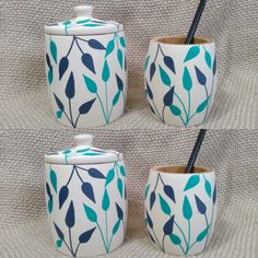 four ceramic containers with blue and green leaves on them, one has a black handle