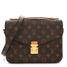 This is an authentic LOUIS VUITTON Monogram Pochette Metis. This chic handbag is finely crafted of classic Louis Vuitton monogram toile canvas. The bag features a vachetta cowhide leather top handle, an optional monogram coated canvas shoulder strap, and a rear zipper pocket. The envelope-style crossover flap opens with a polished gold S-lock to a partitioned brown microfiber interior. Louis Vuitton Monogram Bag, Louis Vuitton Pochette Metis, Louis Vuitton Crossbody Bag, Louis Vuitton Crossbody, Louis Vuitton Empreinte, Louis Vuitton Pochette, Monogram Bag, Chic Handbags, Louis Vuitton Shoulder Bag