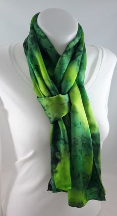 Hand painted silk scarf. Colours used - shades of green - aniseed, leaf and ivy. Design - a striking abstract blended design textured with salt, bold bright colours. Dimensions approx 35cm x180cm / 14 x 72 inches (the steam setting process may cause a little shrinkage). 100% silk satin, a little heavier than my other smooth scarves (weight 12 momme - medium). All edges are hand finished. I have used silk dyes (not paints) as these bond with the fibre of the silk after steam setting, to ensure co Artistic Hand Painted Green Silk Scarf, Artistic Green Silk Scarf, Artistic Hand-dyed Green Scarves, Artistic Hand Dyed Green Silk Scarf, Hand Painted Green Silk Scarf, Green Silk Scarf, Silk Scarf Painting, Hand Painted Silk Scarf, Paint Shades