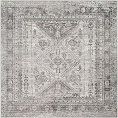 an area rug with grey and white colors