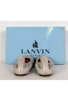 These shoes are made in a durable light grey leather and with a classic ballet flat design. They are comfy and a trendy choice that can be worn for work or play. Size 6 (EU 36) Leather upper, lining & sole Rounded toe Slip on style Some outsole wear Small stain on back of right shoe Come w/ box & dust bag Box has some staining Outsole length 9" Gray Round Toe Flats For Spring, Gray Flats For Spring, Casual White Leather Ballet Flats, Grey Light, Leather Ballet Flats, Ballet Flat, Stylish Shoes, Flat Design, Grey Leather