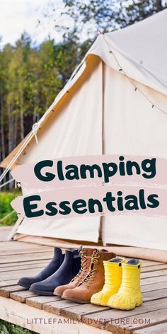 four pairs of boots sitting on top of a wooden platform with the words camping essentials