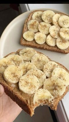 two slices of bread with bananas on them