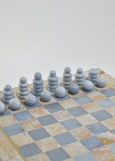 a chess board with several pieces on it