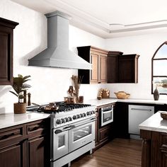 a kitchen with an oven, stove and sink in it's center island area