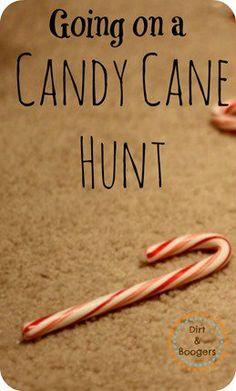 some candy canes are laying on the floor with words going on a candy cane hunt