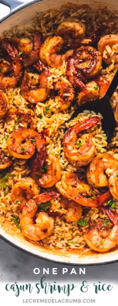 a skillet filled with shrimp and rice