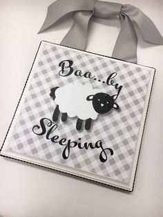 a card with a sheep and the words baa baby sleeping on it