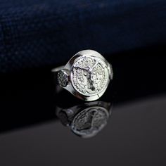 "This Beautiful and Traditional  Saint Benedict Christ is made from high-quality Sterling Silver 925. It's the perfect gift for anyone of any age and excellent for everyday wear.  Item Specifications:  Model #  PAS2 Metal Type: Sterling Silver  Metal Stamp: 925  Shape St. Benedict Christ Style: Traditional  Ring Front : 17mm  (11/16 inch) Size: 6, 7, 8, 9, 10 Stones: No  All jewelry comes in a gift box  We will ship within 1-2 business days by  USPS,  Please make sure your address is correct   As we mention customer service is very important to us and we will work with you to get you your item as quickly as possible and for you to be happy with your purchase.  We will greatly appreciate your feedback to help us recognize and improve our customer service quality. We want always to put a smi Silver Cross Signet Ring Gift, St Benedict Cross, Traditional Ring, Pope Leo, St Benedict, Saint Benedict, Catholic Jewelry, Ring Sterling Silver, Metal Stamping