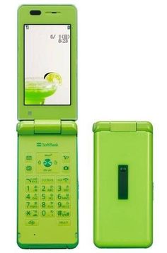 a green cell phone with a lime drink on the screen and an electronic device attached to it