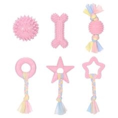 a collection of pink and blue toys on a white background, including teethpicks