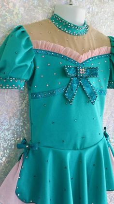 This beautiful figure skating dress is made of 4-way stretch fabrics for maximum comfort. The dress is available in several colors (shown in #43 jade and #17 bubblegum). The front bodice of the dress is fully lined. The colors are bright and electric on the ice. This dress is perfect for practice or competition. OPTIONAL COLORS AVAILABLE. Please include your color choice numbers for dress and accent color in order message. BLING has been added using AB Crystal Swarovski rhinestones. sizes are le Girls Ice Skating, Figure Skating Dress, Jazz Dance Costumes, Ice Skating Dresses, Skating Dress, Burton Snowboards, Figure Skating Dresses, Beautiful Figure, Dance Leotards