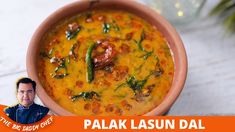 a bowl of food with the words palak lasun dal in front of it