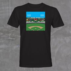 The Coliseum tee is a graphic we created for pins (available in the pin section). This design captures the nostalgia of our childhood with its depiction of the iconic old scoreboards, MT Davis-less bleachers, classic stadium signage, and the beautiful Oakland hills. Relive your favorite baseball memories with this tee. Tees run on the smaller size, we recommend sizing up. Baseball Season Fan Apparel T-shirt With Graphic Print, Fan Merchandise Graphic Print T-shirt In Ring-spun Cotton, Baseball Season Fan Merchandise Graphic Print Tops, Graphic Print Tops For Baseball Season Fan Merchandise, Retro T-shirt With Screen Print For Baseball Season, Retro Screen Print T-shirt For Baseball Season, Retro Graphic Print T-shirt For Baseball Season, Stadium Signage, Oakland Hills