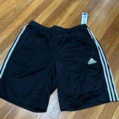 Adidas 3 Stripe Shorts With Zip Front Pockets Adidas Black Athletic Shorts With Built-in Shorts, Black Athletic Shorts With Three Stripes, Black Striped Athletic Shorts, Casual Black Athletic Shorts With Three Stripes, Sporty Short Black Pants, Adidas Casual Black Bottoms, Adidas Black Shorts With Built-in Shorts, Adidas Black 2-in-1 Shorts, Adidas Black Shorts