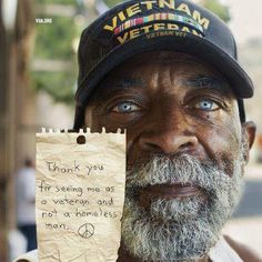 an old man with a note attached to his face that says thank you for serving me as a veteran and not a homeless man