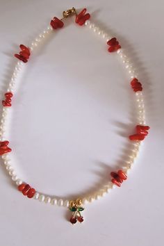 Necklace with pearls coral and zircon cherry. Comes with 5cm extension Necklace With Pearls, Cherry Necklace, Handmade Jewelry Diy, Pearl Chain, Beaded Necklaces, Jewelry Diy, How To Make Beads, Chain Styles, Favorite Jewelry