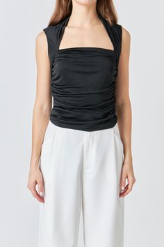 This sleeveless draped ruched top is a perfect pick for any occasion! With its stretch fabric and off-the-shoulder silhouette this modern top contours the body in all the right places. The ruching details contribute to its unique on-trend look. Look and feel great with this stunning addition to your wardrobe. The perfect mix of trendy and timeless styles that will never go out of fashion! Stretched Draped Ruched Sleeveless Fitted Hand wash cold Do not bleach Do not tumble dry Iron low Shell: 95% Polyester 5% Spandex Lining: 100% Polyester Exclusive of Elastic HN2313T Total length: 24.5" Bust: 31.5" XS WHITE: Height 5'9" / Bust 30.5" / Waist 24" / Hips 34.5" BLACK: Height 5'9" / Bust 30.5" / Waist 24" / Hips 34.5" RED: Height 5'9" / Bust 30.5" / Waist 24" / Hips 34.5" Ruched Top With Stretch And Asymmetrical Neckline, Asymmetrical Neckline Top With Ruched Stretch, Stretch Top With Ruched Asymmetrical Neckline, Asymmetrical Neckline Top With Ruched Detail, Elegant Ruched Stretch Tank Top, Chic Draped Elastane Tops, Elastane Ruched Tops For Night Out, Ruched Draped Top In Elastane, Ruched Draped Elastane Top