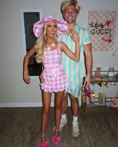 the man and woman are dressed up in costumes for their costume party, as well as pink shoes