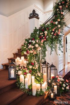 an instagram page with candles and flowers on the stairs, surrounded by greenery