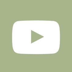 a green background with a white play button on the bottom right corner and an arrow in the middle