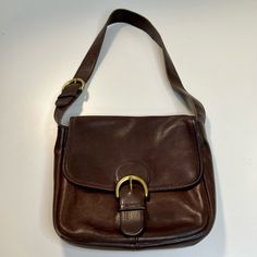 Reposhing This Item. Loved It But Never Ended Up Wearing It. Coach Vintage Legacy Bedford Saddle Mail Bag In Brown Leather This Vintage Soho Bedford Flap Bag Is A Beloved Coach Silhouette First Introduced In 1997. Made In The Usa, Gorgeous Classic Bag. In Very Good Condition - Some Wear As Seen In Photos. Glovetanned Leather Inside Zip And Multifunction Pockets Snap Closure, Leather Lining Outside Slip Pocket 10 1/2" (L) 8" (H) 3" (W) Coach Forever Collection Style No. Cf116 4164 Mail Bag, Bags Coach, Classic Bags, Vintage Coach, Flap Bag, Soho, Coach Bags, Snap Closure, Saddle