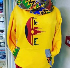 Beautiful hoodie with Ankara touch. Very warm best for winter seasons 100% handmade  We do customize that make it available in all sizes We ship via DHL express For wholesale prices please contact me via message Yellow Winter Hoodie With Drawstring Hood, Yellow Hooded Hoodie With Kangaroo Pocket, Yellow Cotton Hoodie With Kangaroo Pocket, Yellow Winter Hooded Top With Drawstring, Yellow Hooded Winter Top, Yellow Long Sleeve Sweatshirt With Adjustable Hood, Yellow Hooded Sweatshirt With Kangaroo Pocket, Yellow Cotton Hoodie With Adjustable Hood, Yellow Hooded Hoodie For Winter