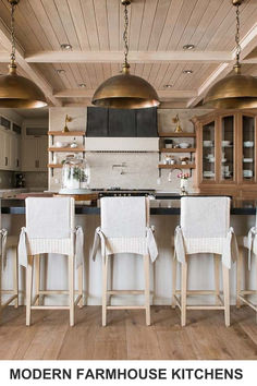 modern farmhouse kitchen with white chairs and wood flooring