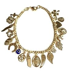 "18k gold filled charm (virgin mary,elephant,evil eye,hamsa,money bag,heart,crystal ,horseshoe cross)bracelet for good luck and protection..7.5\" long . pulsera de buena suerte en18k gold filled. para proteccion y buena suerte.7.5\" largo." Gold Spiritual Rosary Bracelet With Charms, Spiritual Gold Rosary Bracelet With Charms, Gold Charm Bracelet With Symbolic Dangling Charms, Gold Spiritual Charm Bracelet With Dangling Charms, Gold Spiritual Charm Bracelet For Good Luck, Money Bracelet, Horseshoe Cross, Urban Jewelry, Fantasy Gifts