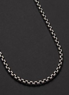 For the men that want to keep their jewelry to a minimum and still make a statement, this oxidized sterling silver chain necklace is the perfect piece. Material: Oxidized .925 Sterling Silver chain and clasps. Width: 3.7 mm Length: 18, 20, 22, 24 inches long. Clasp: Lobster. Type: Round Venetian Box Chain. Made in the USA. Black Sterling Silver Box Chain Necklace, Sterling Silver Black Box Chain Necklace, Gunmetal Box Chain Necklace As Gift, Gunmetal Box Chain Jewelry As Gift, Minimalist Gunmetal Jewelry With Box Chain, Gunmetal Box Chain Necklace Gift, Minimalist Gunmetal Box Chain Jewelry, Gunmetal Box Chain Link Necklace, Black Sterling Silver Link Chain Necklace