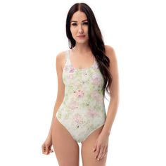 Whether you're lounging by the pool (pretending to read), or frolicking in the surf, our Watercolor Floral swimsuit is the perfect addition to you swimsuit collection! • 82% Polyester, 18% Spandex • Fabric weight: 6.78 oz/yd² (230 g/m²), weight may vary by 5% • Chlorine-resistant fabric • Cheeky fit with a scoop neckline and a low scoop back • Zig-zag stitching • Double-layer front • Four-way stretch material stretches and recovers on the cross and lengthwise grains This product is made especial Fitted Beachwear Swimwear For Lounging, Stretch Bodysuit For Summer Lounging, Stretch Bodysuit For Lounging In Summer, Beachy Bodysuit For Pool And Spring, Beachy Bodysuit For Spring Pool Occasions, Beachy Bodysuit For Pool Spring Season, Beachy Bodysuit For Pool In Spring, Beachy Bodysuit For Pool And Spring Season, Fitted Swimwear For Summer Lounging