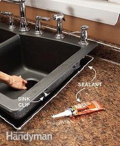 a man is fixing a kitchen sink in the middle of a counter top with an ad for handyman on it