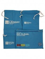 two blue laundry bags sitting next to each other