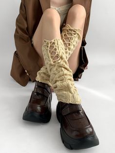 Elevate your outfit with these enchanting knit leg warmers. Featuring intricate lace-up details and self-tie straps, these leg warmers allow for a customizable fit that perfectly complements your style. Available in three versatile colors, they are the perfect accessory for both casual and dressy occasions. Garment SizeSizeFree SizeFull Length40Cuff20/22 Beige Leg Warmers, Vrchat Model, Legwarmers Outfit, Kawaii Leg Warmers, Knitted Leg Warmers, Elevate Your Outfit, Steampunk Fashion Male, Gothic Skirts, Knit Leg Warmers