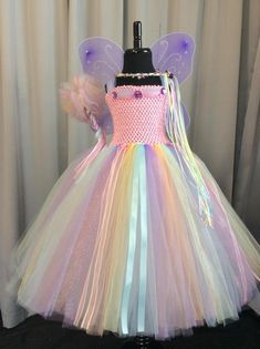 Pastel Rainbow Fairy Princess Costume Tutu Dress Up Set | Etsy Fairytale Fairy Dress With Ruffles For Dress-up, Pink Tulle Fairycore Dress, Pink Fairycore Dress With Tulle Material, Fairy Style Party Dress, Multicolor Fairy Dress For Dress-up, Fairy Style Pink Princess Dress For Dress-up, Whimsical Tulle Princess Dress, Pink Fairy Dress With Ruffles, Fairy Kei Purple Party Dress