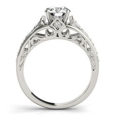 This romantic ring features 1/2 ctw. of brilliant diamonds that adorn the band. A 0.25 ct. or larger center stone of any shape can be set with this ring. Classic Proposal Cluster Ring With Diamond Accents, Classic Cluster Ring With Diamond Accents For Proposal, Diamond Solitaire Filigree Ring Round Cut, Diamond Filigree Ring With Center Stone And Round Cut, Diamond Solitaire Filigree Ring, Diamond Filigree Ring With Brilliant Cut For Promise, Brilliant Cut Diamond Filigree Promise Ring, Diamond Filigree Ring With Round Cut For Promise, Round Cut Diamond Filigree Promise Ring