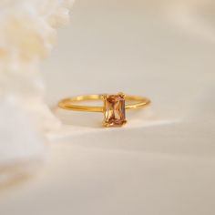 Citrine Emerald Solitaire Ring Elegant Citrine Crystal Ring With Birthstone, Elegant Citrine Birthstone Crystal Ring, Elegant Citrine Solitaire Birthstone Ring, Elegant Crystal Ring With Rectangular Stone, Timeless Emerald-cut Birthstone Ring For Gift, Timeless Emerald Cut Birthstone Ring Gift, Minimalist Emerald-cut Birthstone Promise Ring, Minimalist Emerald Cut Birthstone Ring, Minimalist Emerald Cut Birthstone Promise Ring