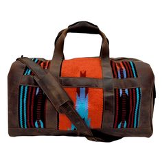 Stunning and Functional. 100% Buffalo Leather known for its durability, vintage look and Handwoven Wool. This eye catching weekender is meant for getaways. The southwestern boho design and our top grain leather stands out in a crowd and is sure to be show stopper. The leather only gets better with time and patina's with each use. Perfect carry on or weekend get away bag. Each bag comes with a Ranch Junkie gift box + a 1oz. leather conditioner. Available in a Dark Vintage Brown and Antique Saddle Rustic Brown Travel Bag, Southwestern Brown Rectangular Shoulder Bag, Southwestern Style Brown Rectangular Shoulder Bag, Brown Southwestern Rectangular Shoulder Bag, Western Hand Tooled Travel Bag, Western Style Hand-tooled Travel Bag, Western Style Rectangular Travel Bag, Western Style Rectangular Shoulder Bag For Travel, Western Style Travel Bag With Leather Backing