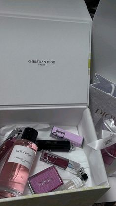 an open box containing several different types of perfumes