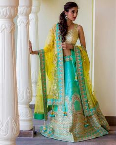 Mint sister of the bride lehenga with contrast yellow net dupatta. #Frugal2Fab Lehenga For Bride Sister, Jaipur Lehenga, Gota Patti Lehenga, Lehenga For Bride, Bride Lehenga, Organza Kurta, Sister Of The Bride, Raw Silk Lehenga, Mehendi Outfits