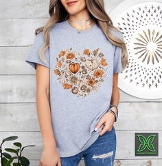 Fall Heart Women Shirt, Fall Pumpkin T-Shirt,Autumn Leaves and Pumpkins Tee,Fall Lover Floral Gift,Family Thanksgiving Shirt,Love Fall Y'All HOW TO ORDER 1. From the two Drop-down menus select the Size and the Shirt Color you need. 2. Add these to your cart. *You will need to return to the listing to add the other sizes and designs you need before checking out. 3. After adding all the shirts to the Cart, Checkout them together. DELIVERY & RETURN Order Processing time for Dispatch: 1 working days Cute Fall Tops With Heart Graphic, Cute Heart Graphic Tops For Fall, Fall Cotton T-shirt With Heart Graphic, Cotton Heart Graphic T-shirt For Fall, Cotton T-shirt With Heart Graphic For Fall, Family Matching Short Sleeve Tops For Fall, Fall Family Matching Crew Neck Tops, Family Thanksgiving, Love Fall