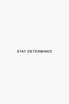 the words stay determined written in black on a white background