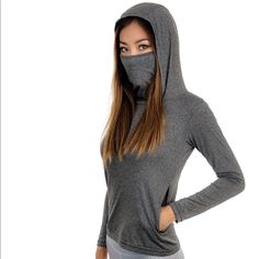 Clearance Price!! Brand New Women’s Long Sleeve Hooded Shirt With Built In Mask. Gray. Lightweight. Comes In Size Xs, S, M, L, Xl Model Wears Size Xs - 3 Layer Mask Polyester Blend - Sweat Wicking, Buttery Soft, Four Way Stretch Material -Inner Pocket For Nose Bridge -One Zippered Pocket With Stash Pocket For Removable Nose Bridge -Non Medical Grade Face Shield Masks, Hooded Long Sleeve Shirt, Full Face Mask, Layer Mask, Hooded Shirt, Face Shield, Long Sleeve Shirt, Sleeve Shirt, Face Mask