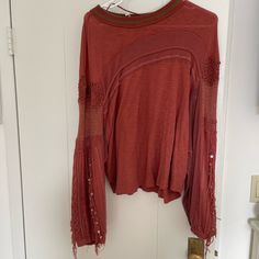 Free People Sweater With Fringe And Embroidery, Size M Never Worn Fall Embroidered Sleeve Fitted Tops, Casual Crew Neck Top With Embroidered Sleeves, Red Bohemian Crew Neck Blouse, Embroidered Long Sleeve Tops For Fall, Casual Festival Tops With Embroidered Sleeves, Casual Festival Top With Embroidered Sleeves, Long Sleeve Tops With Floral Embroidery For Fall, Casual Tops With Embroidered Sleeves For Festival, Long Sleeve Floral Embroidered Tops For Fall