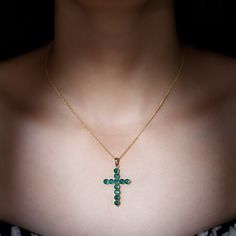 Product Details This Stackable Cross Necklace is crafted in solid gold and designed specifically for women. It features a Round Cut Created Emerald in a prong Setting, which adds a touch of glamour and helps you shine brightly like never before. Product Information SKU SHP-PENDANT042160045 Length 36.5 mm Width 21.5 mm Weight 3.41 gm (Approximate) LAB CREATED EMERALD INFORMATION No.of Stones 11 Pieces Total Weight 2.97 Carat (Approximate) Dimension(approx) Round-4X4 mm-11 Pcs Color Green Cut Bril Gold Emerald Pendant Necklace In 14k Gold, Yellow Gold Emerald Pendant Necklace With Gemstone Accents, Luxury 14k Gold Emerald Pendant Necklace, Exquisite Gold Emerald Pendant Necklace, Emerald Cross Pendant, Emerald Cross, Lab Created Emerald, Cross Pendant Necklace, Cross Pendant