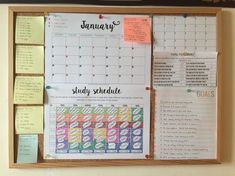 a bulletin board with sticky notes attached to it and the words january written in cursive writing